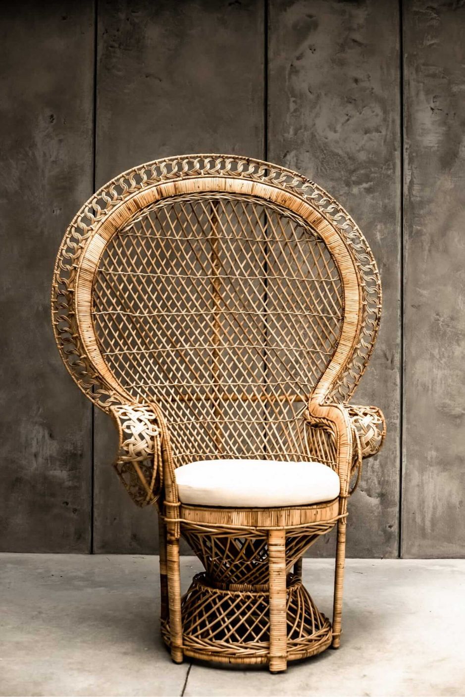 Peacock rattan chair with high back and cream cushion, handcrafted from natural rattan, perfect oversized boho accent for indoor or covered outdoor spaces