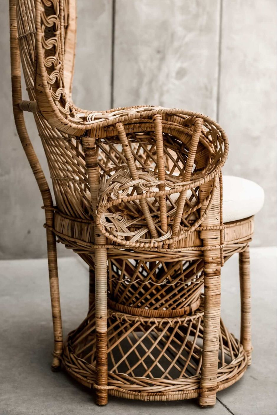 Peacock rattan chair with high back and cream cushion, handcrafted from natural rattan, perfect oversized boho accent for indoor or covered outdoor spaces