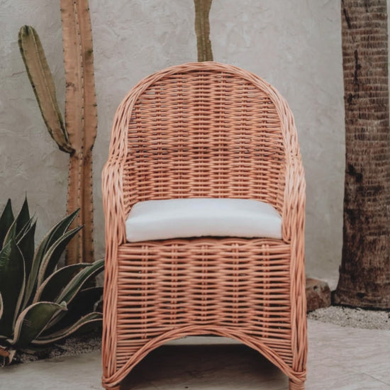 Handmade Ingka Alo cognac rattan chair with thick weave, natural tones, perfect for modern living spaces