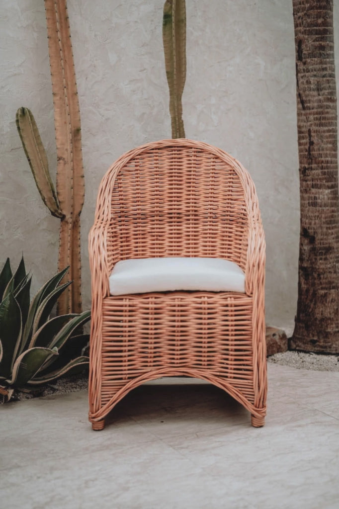 Handmade Ingka Alo cognac rattan chair with thick weave, natural tones, perfect for modern living spaces