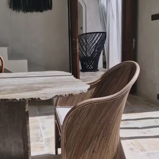 Handcrafted brown rattan Doris chair from Tegal collection, perfect for modern patio or living space