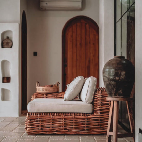 Handmade Ingka modular armchair in cognac rattan with thick weave, versatile as standalone chair or part of modular sofa for living room, terrace, or patio.