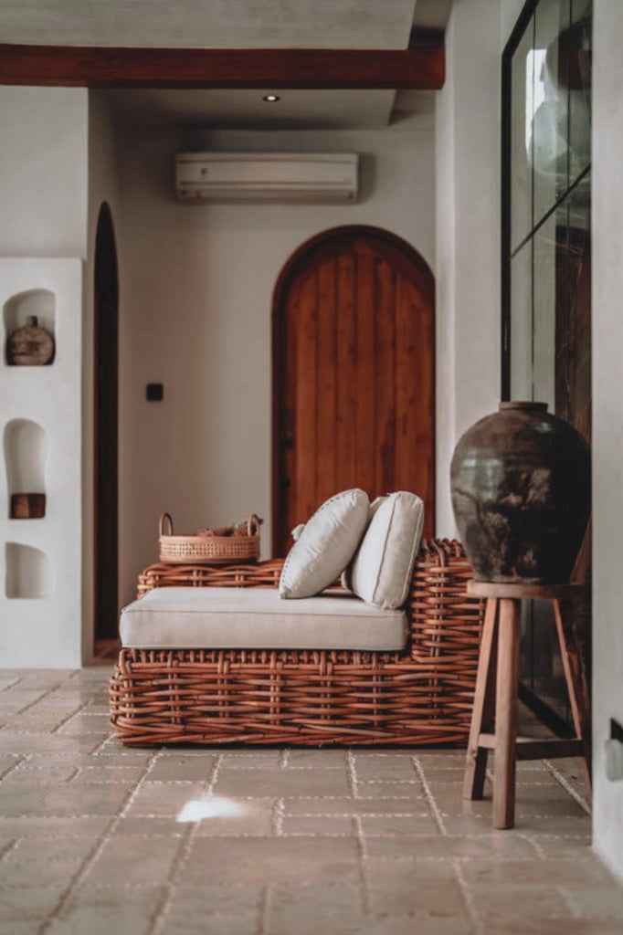Handmade Ingka modular armchair in cognac rattan with thick weave, versatile as standalone chair or part of modular sofa for living room, terrace, or patio.