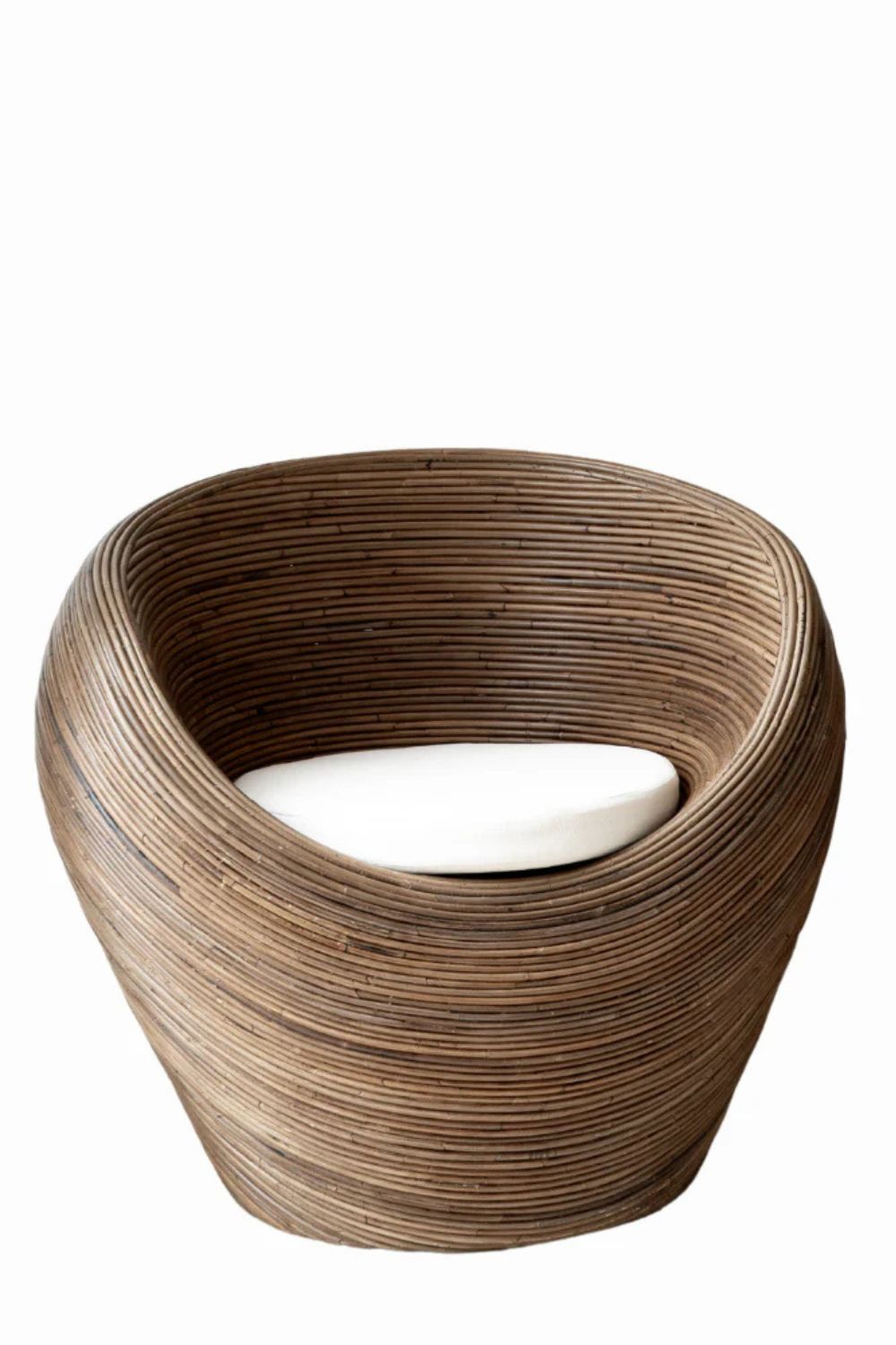 Handmade rattan armchair in dark brown with boho style, perfect for cozy living spaces