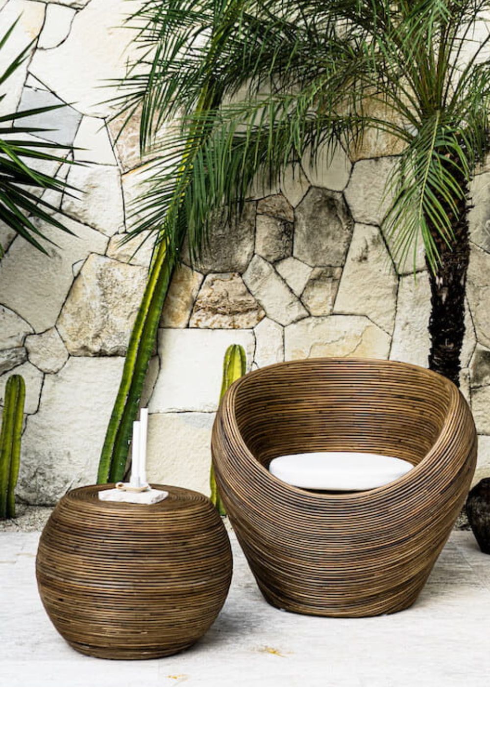 Handmade rattan armchair in dark brown with boho style, perfect for cozy living spacesx