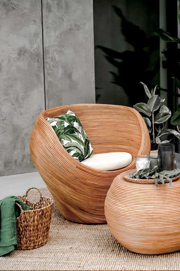 Handmade rattan armchair in cognac brown with boho style, perfect for cozy living spaces