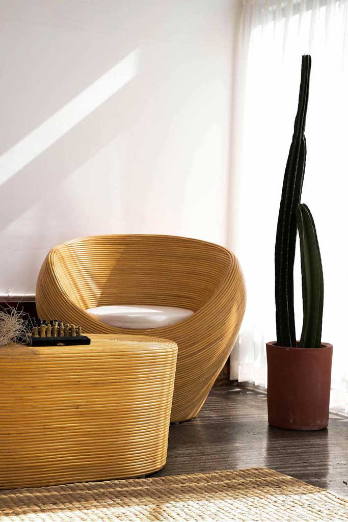 Handmade rattan armchair natural with boho style, perfect for cozy living spaces