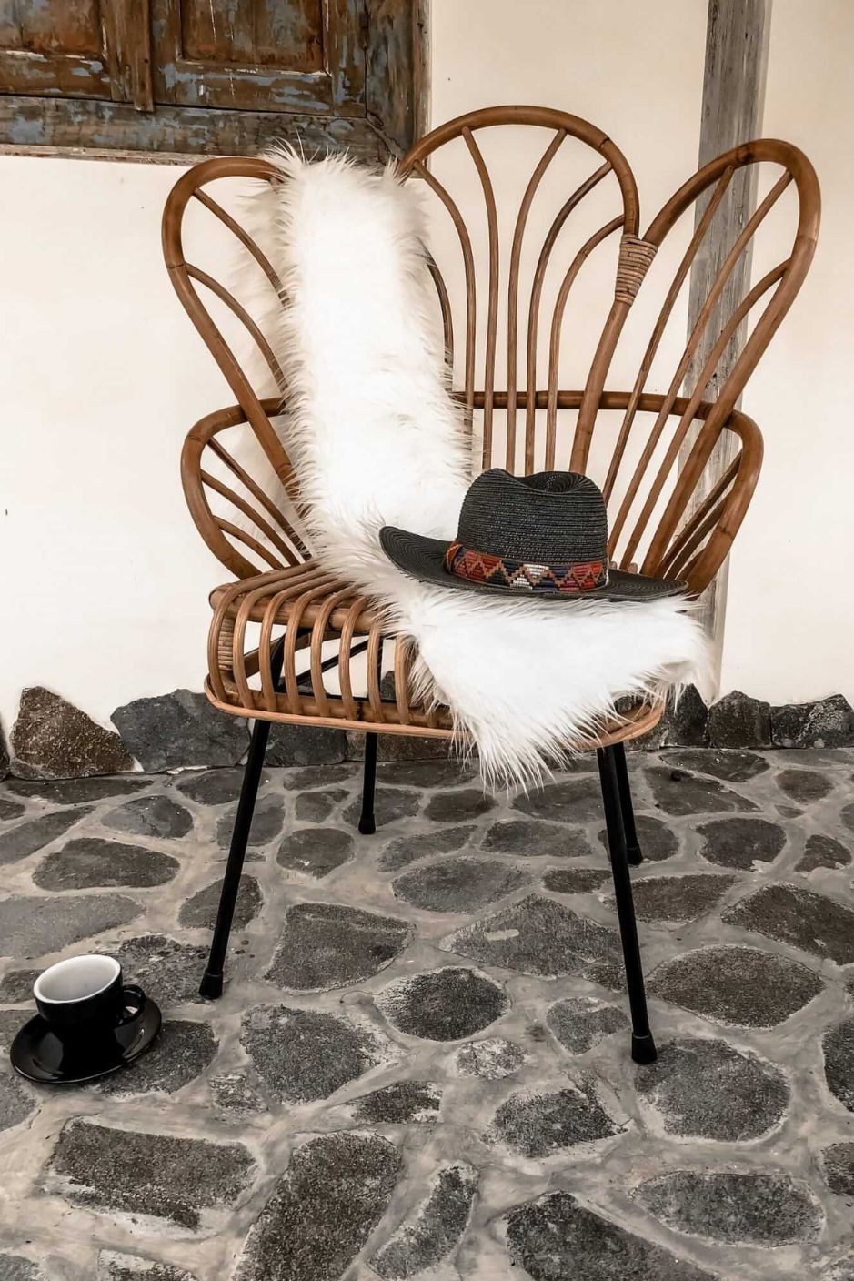 Handcrafted Rattan Lotus Flower Chair with woven rattan design and petal-shaped backrest, ideal for indoor and outdoor bohemian-style living spaces