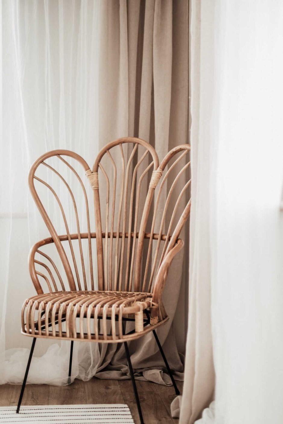 Handcrafted Rattan Lotus Flower Chair with woven rattan design and petal-shaped backrest, ideal for indoor and outdoor bohemian-style living spaces