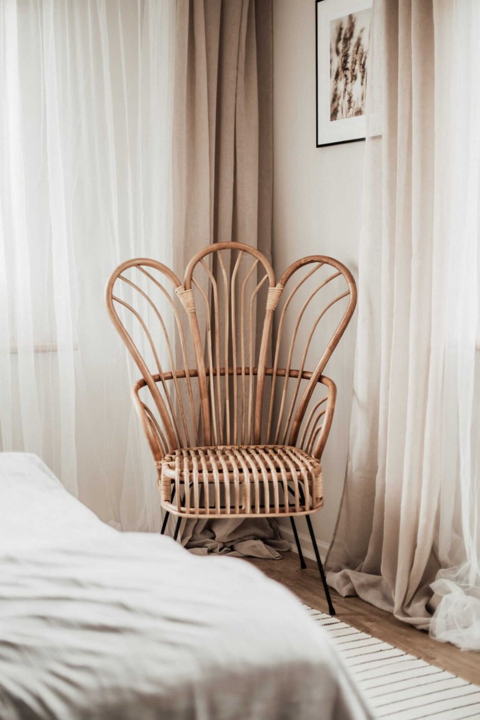 Handcrafted Rattan Lotus Flower Chair with woven rattan design and petal-shaped backrest, ideal for indoor and outdoor bohemian-style living spaces