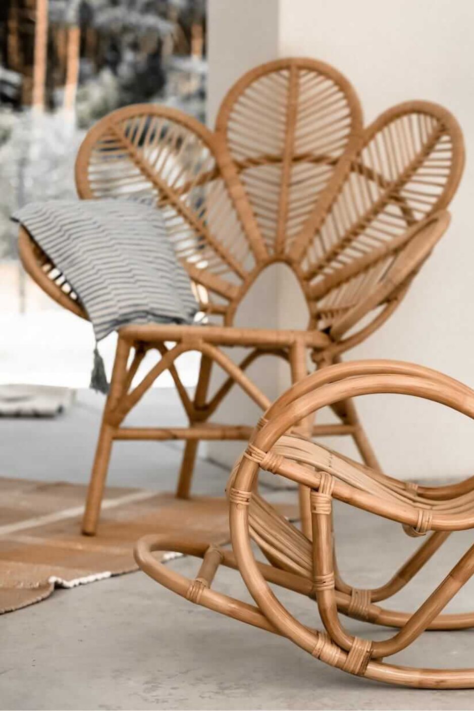 Rattan Monna Flower Chair featuring a handcrafted petal-shaped backrest and natural rattan weave, offering elegant bohemian style for indoor or outdoor spaces