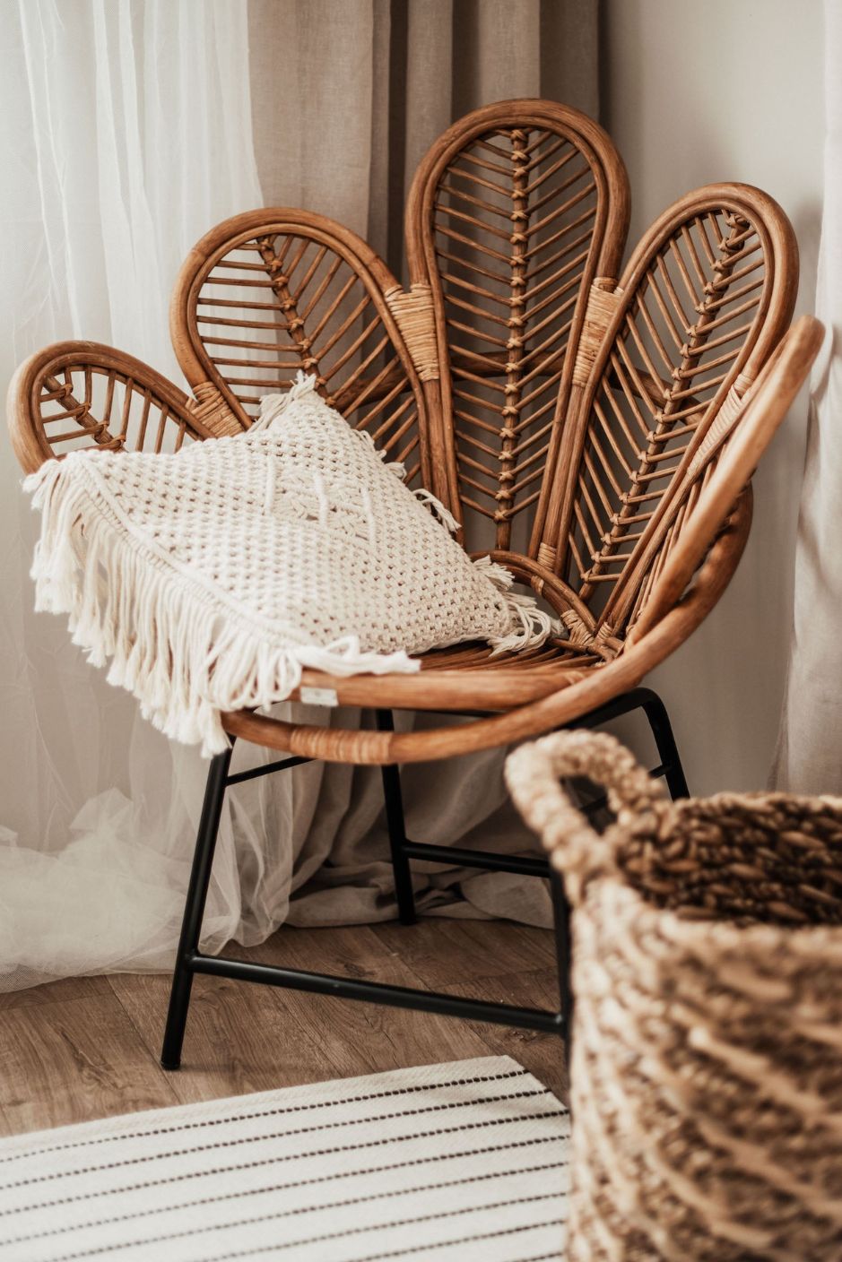 Rattan Sia Flower Chair in warm cognac finish - handcrafted bohemian furniture featuring a petal-shaped backrest and natural rattan weave, perfect for living rooms or patios