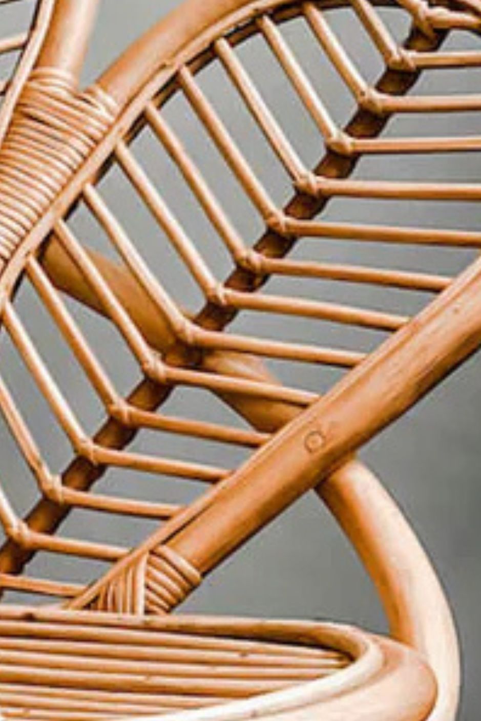 Rattan Sia Flower Chair in natural finish - handcrafted bohemian furniture with a petal-shaped backrest and woven rattan design, ideal for living rooms, bedrooms, or outdoor spaces