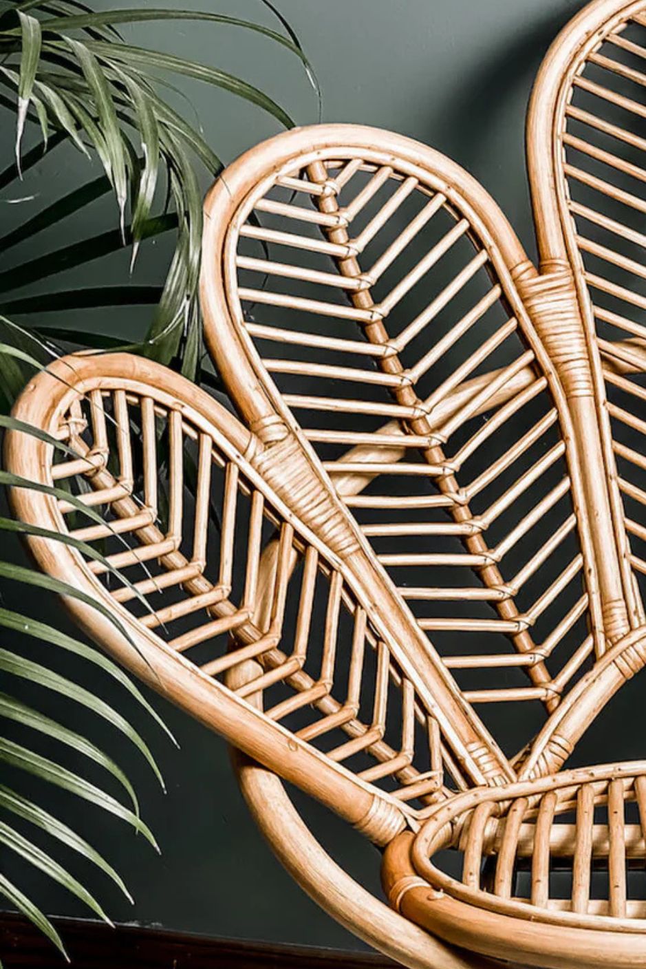Rattan Sia Flower Chair in natural finish - handcrafted bohemian furniture with a petal-shaped backrest and woven rattan design, ideal for living rooms, bedrooms, or outdoor spaces