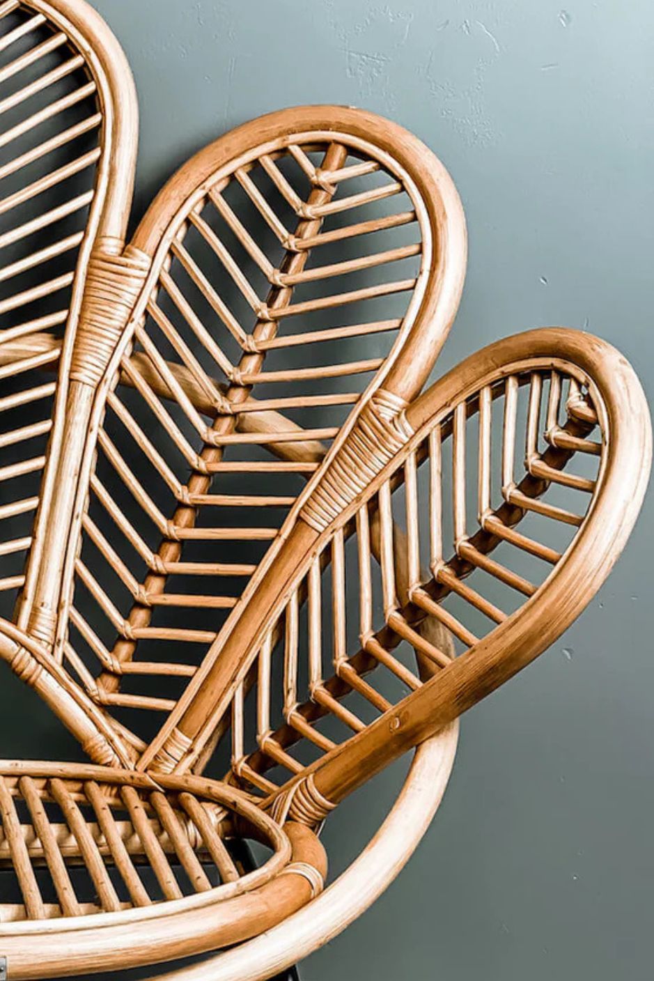Rattan Sia Flower Chair in natural finish - handcrafted bohemian furniture with a petal-shaped backrest and woven rattan design, ideal for living rooms, bedrooms, or outdoor spaces