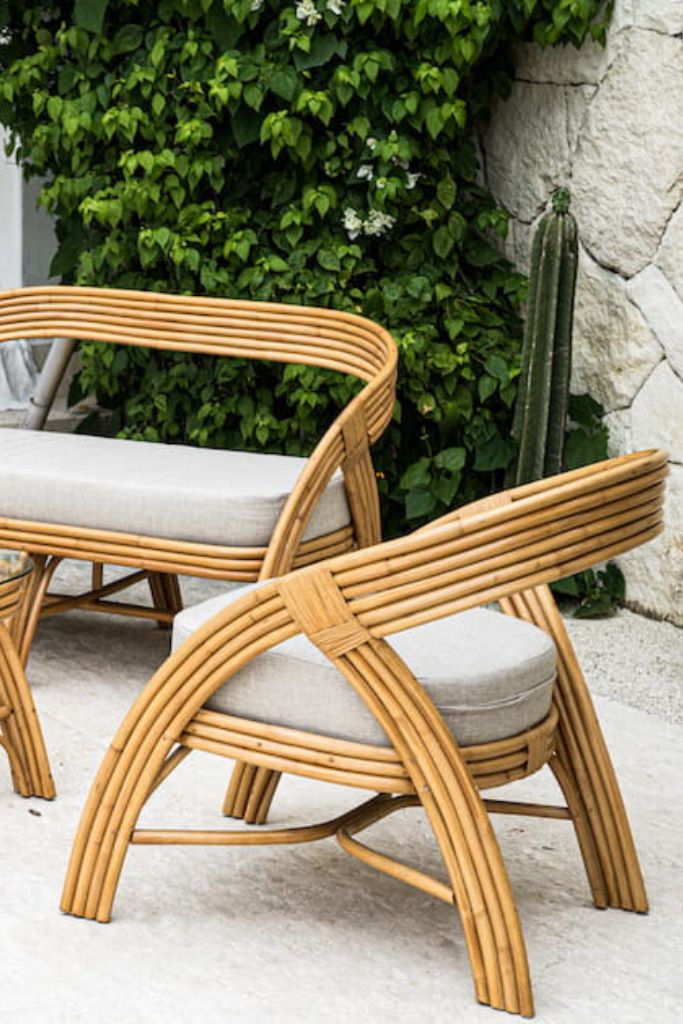 Handmade Sali rattan chair with opalescent autumn tones, cubic design, and soft seat cushion, perfect for natural and boho-inspired interiors.