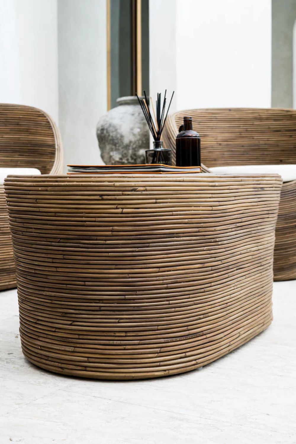 Tegal Oval Rattan Table in rich brown finish, handwoven from durable natural rattan for indoor or outdoor use
