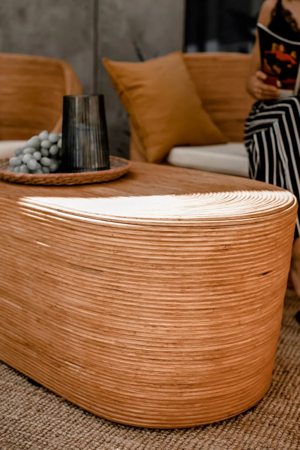 Tegal Oval Rattan Table in rich cognac finish, handwoven from durable natural rattan for indoor or outdoor use