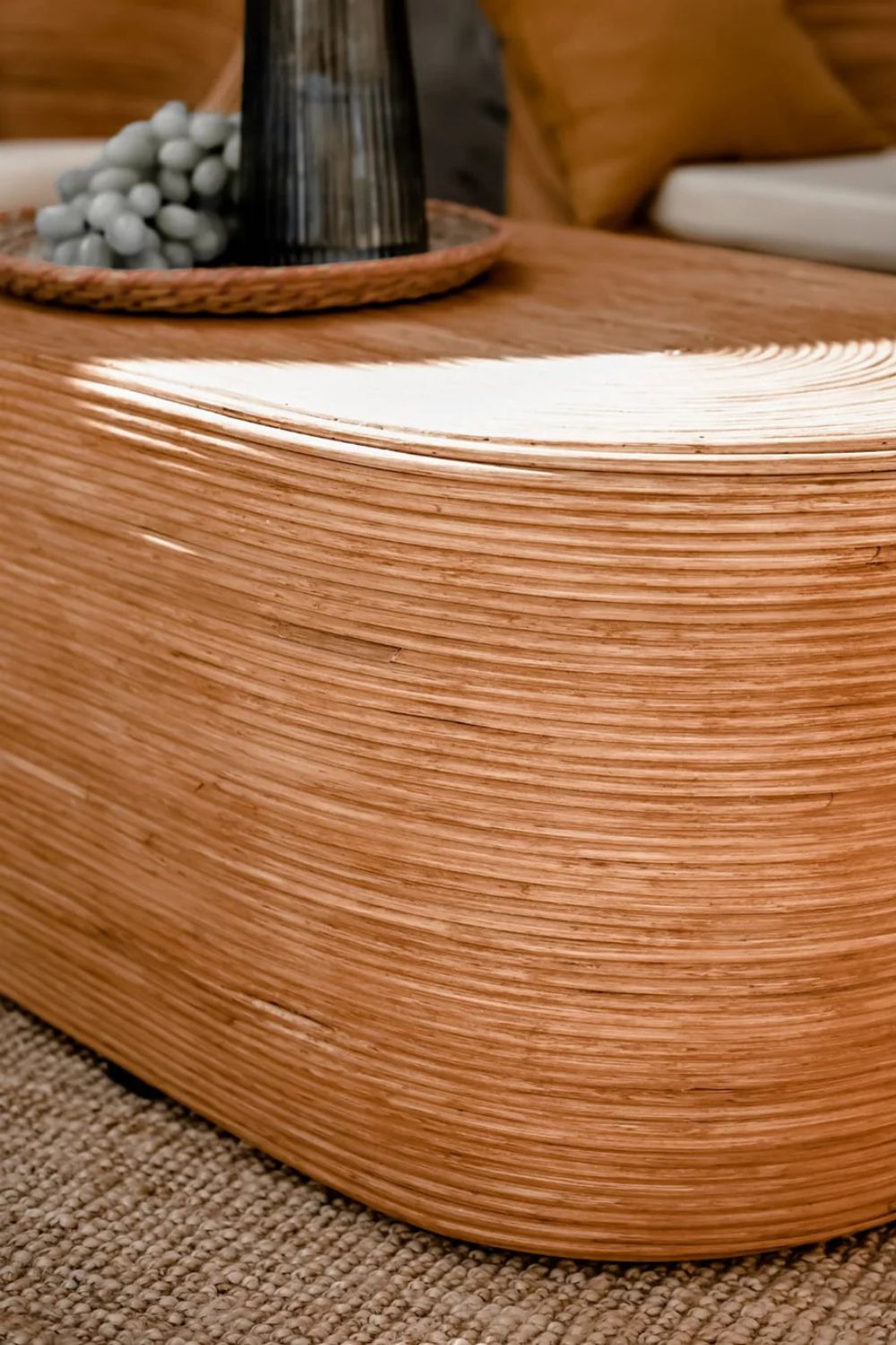 Tegal Oval Rattan Table in rich cognac finish, handwoven from durable natural rattan for indoor or outdoor use