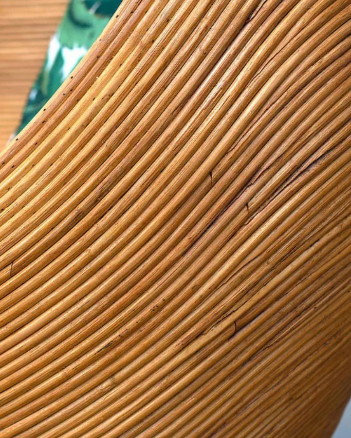 Handmade rattan armchair in cognac brown with boho style, perfect for cozy living spaces