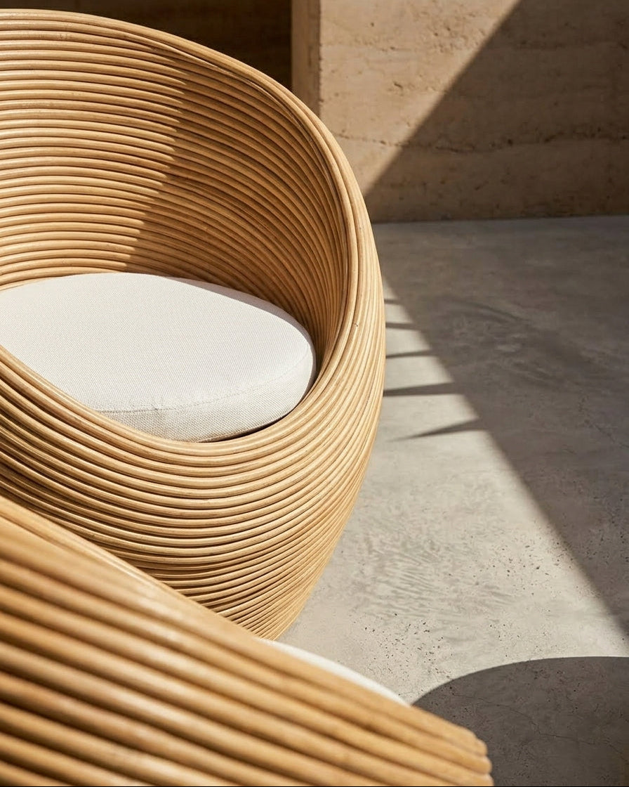 Handmade rattan armchair natural with boho style, perfect for cozy living spaces.