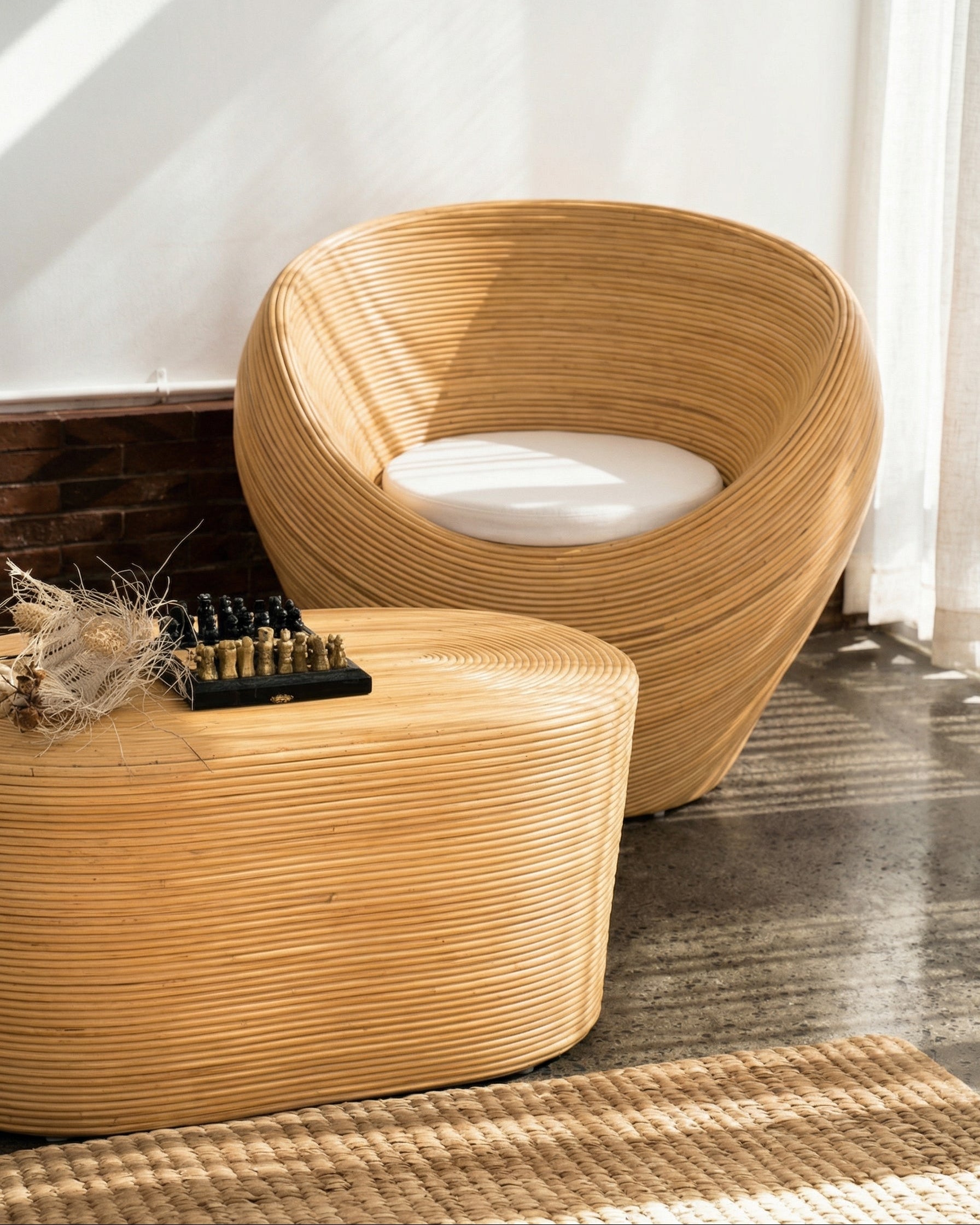 Handmade rattan armchair natural with boho style, perfect for cozy living spaces.
